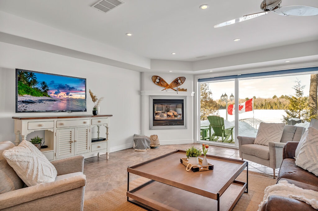 living room with corner fireplace