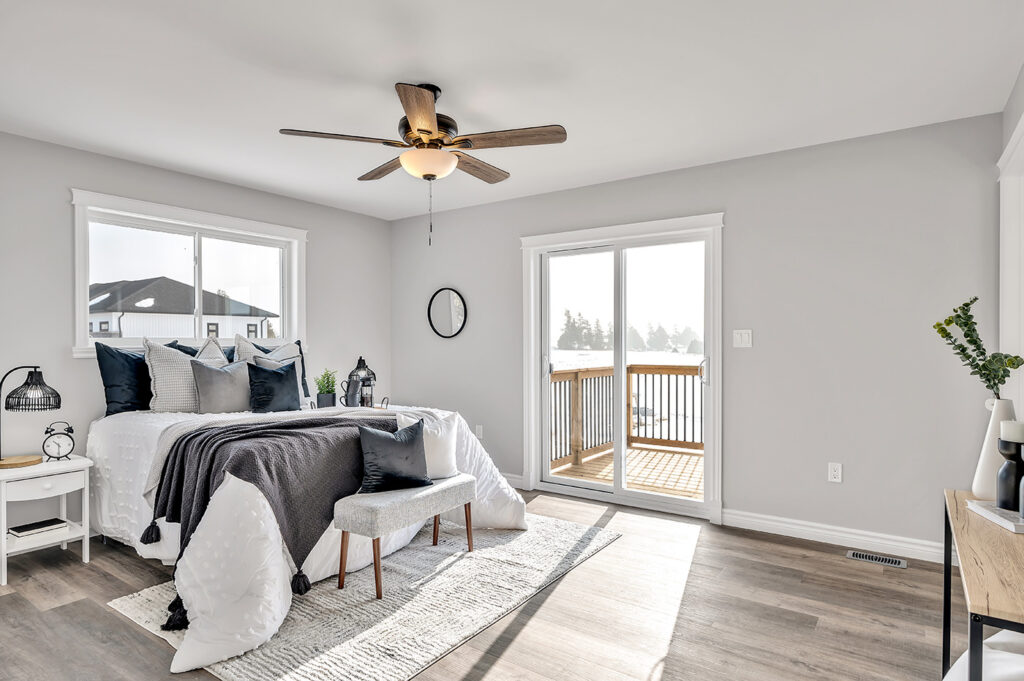 bedroom with glass doors to deck